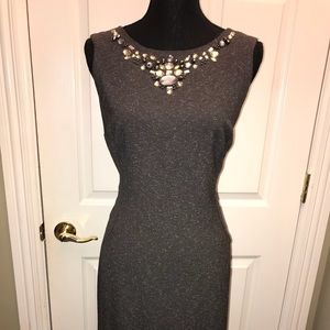 Cute sleeveless dress w/ slight split.